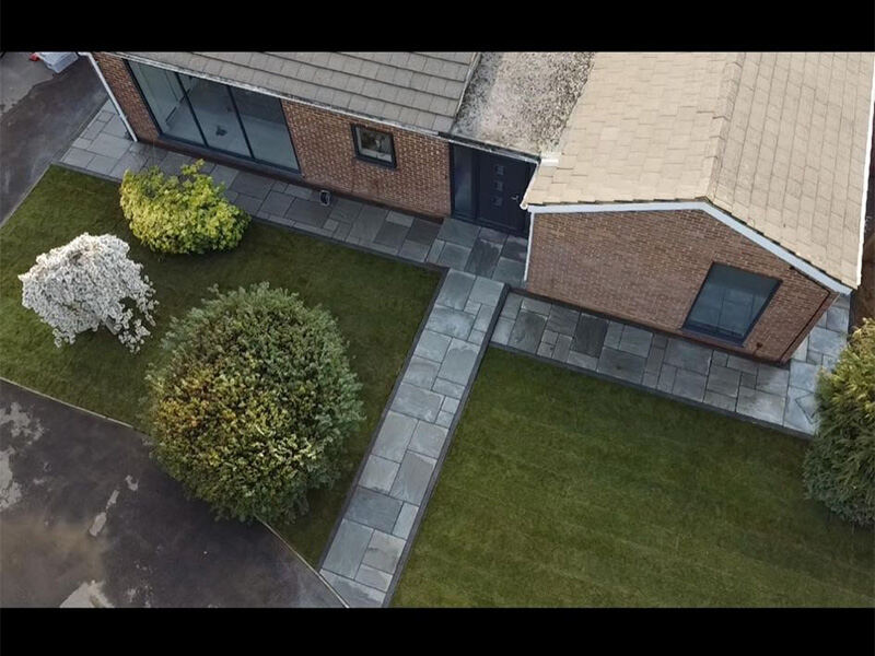 Paved path and front garden seen from above