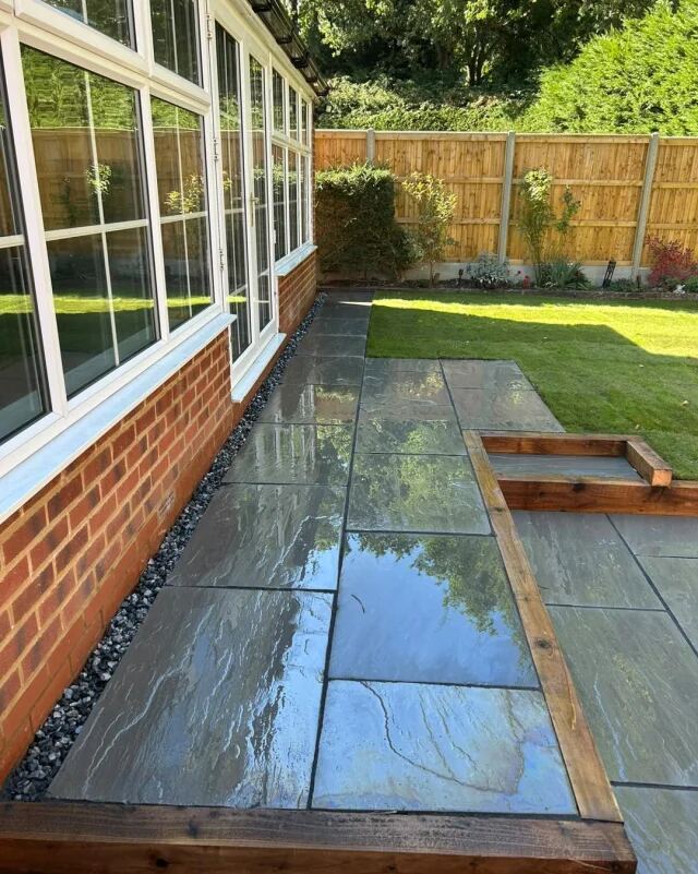 45m² grey sandstone patio & 50m² fresh turf
