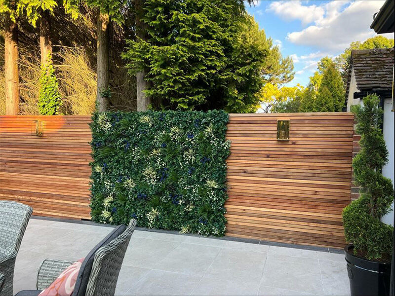 Cedar slatted screen fencing on a patio
